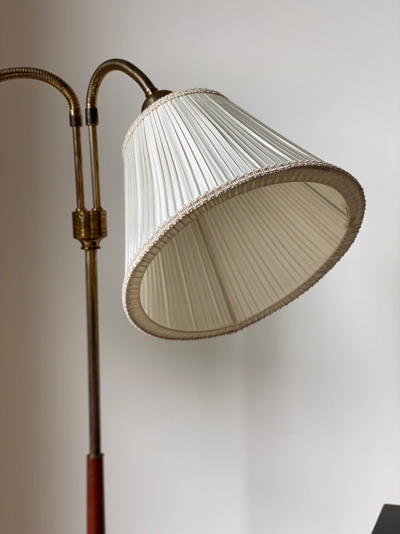 KEPT London Stock A brass and teak floor lamp, mid 20th century