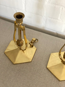 KEPT London A pair of brass ship candlesticks