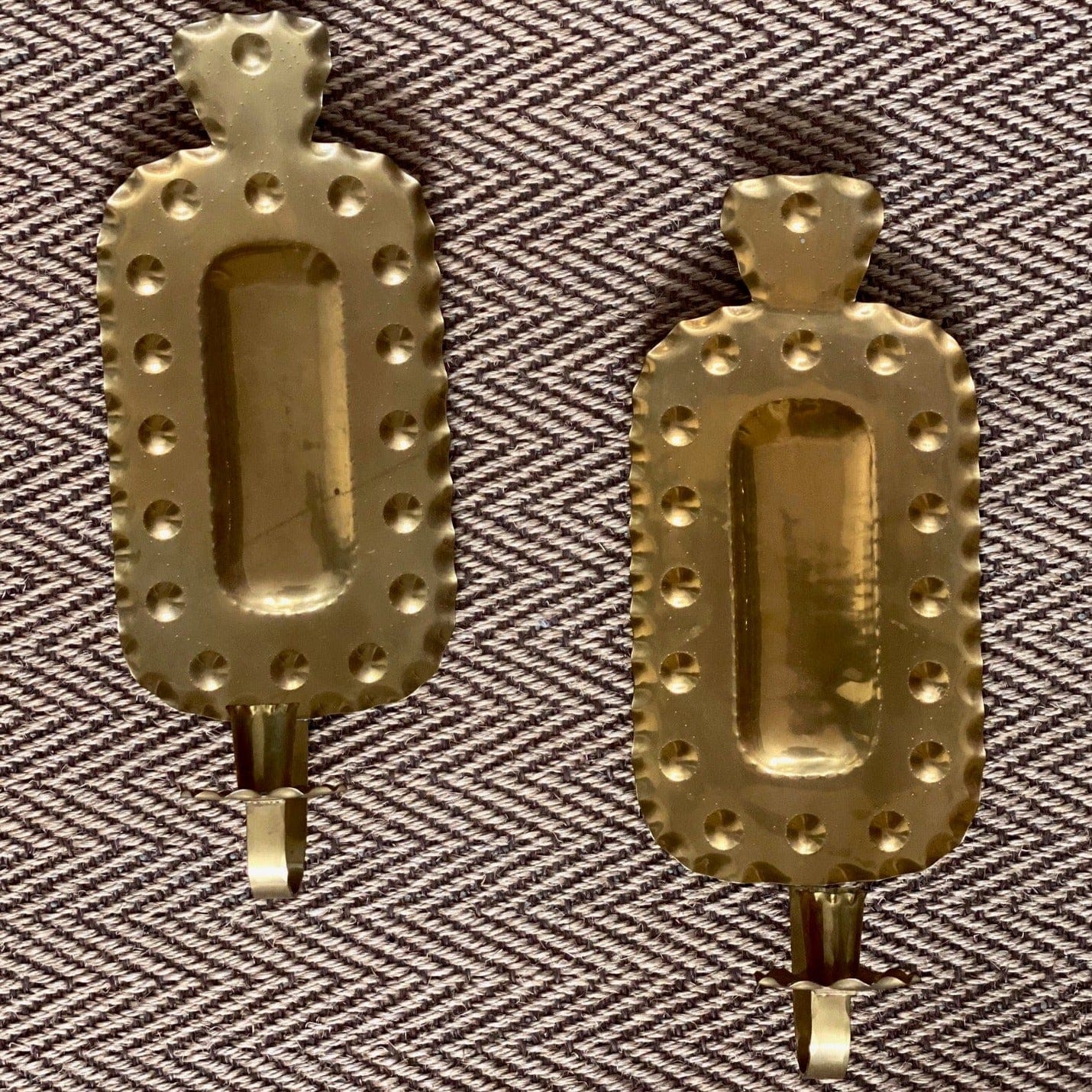 KEPT London A pair of hammered brass wall sconces