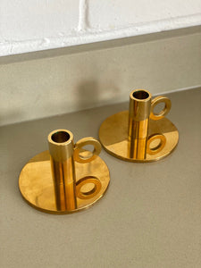 KEPT London A pair of heavy brass chambersticks
