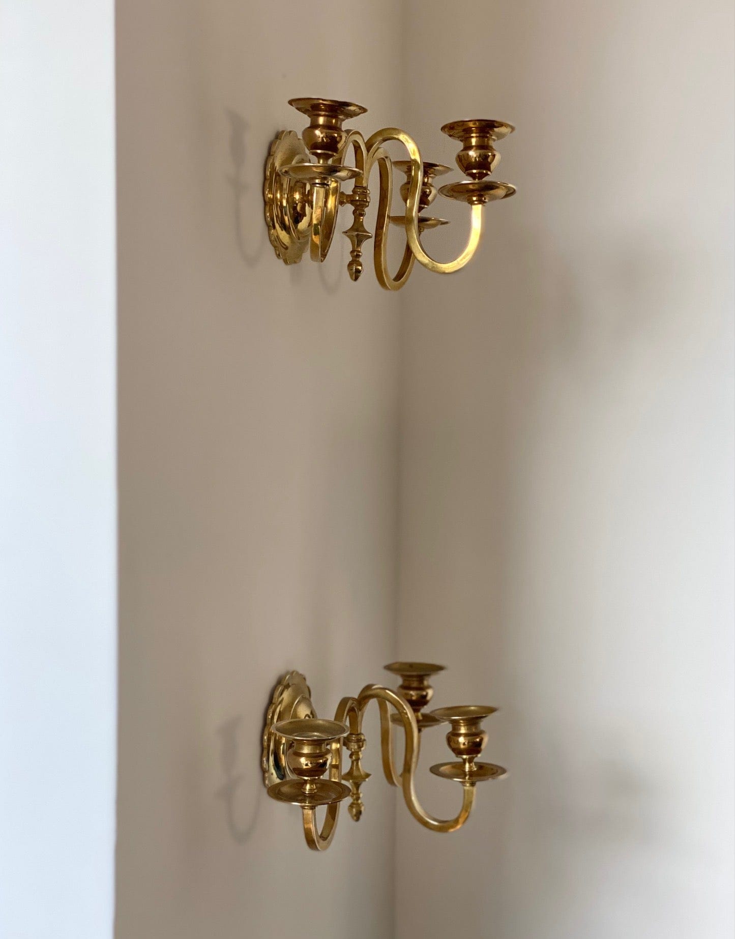 KEPT London Stock A pair of scalloped brass wall sconces