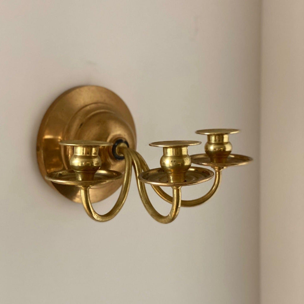KEPT London A pair of three armed wall sconces