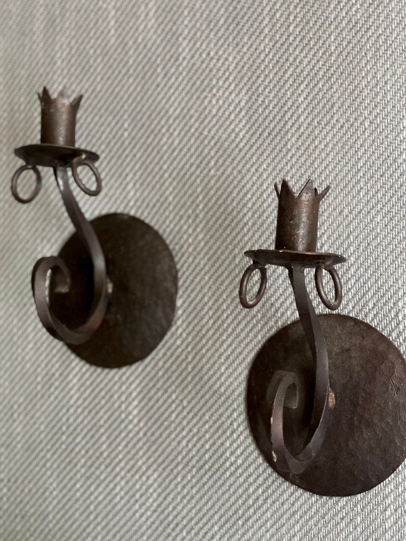 KEPT London A pair of wrought iron wall sconces