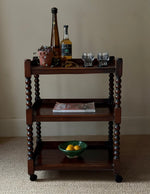 Load image into Gallery viewer, KEPT London Stock Bobbin turned three tier drinks trolley
