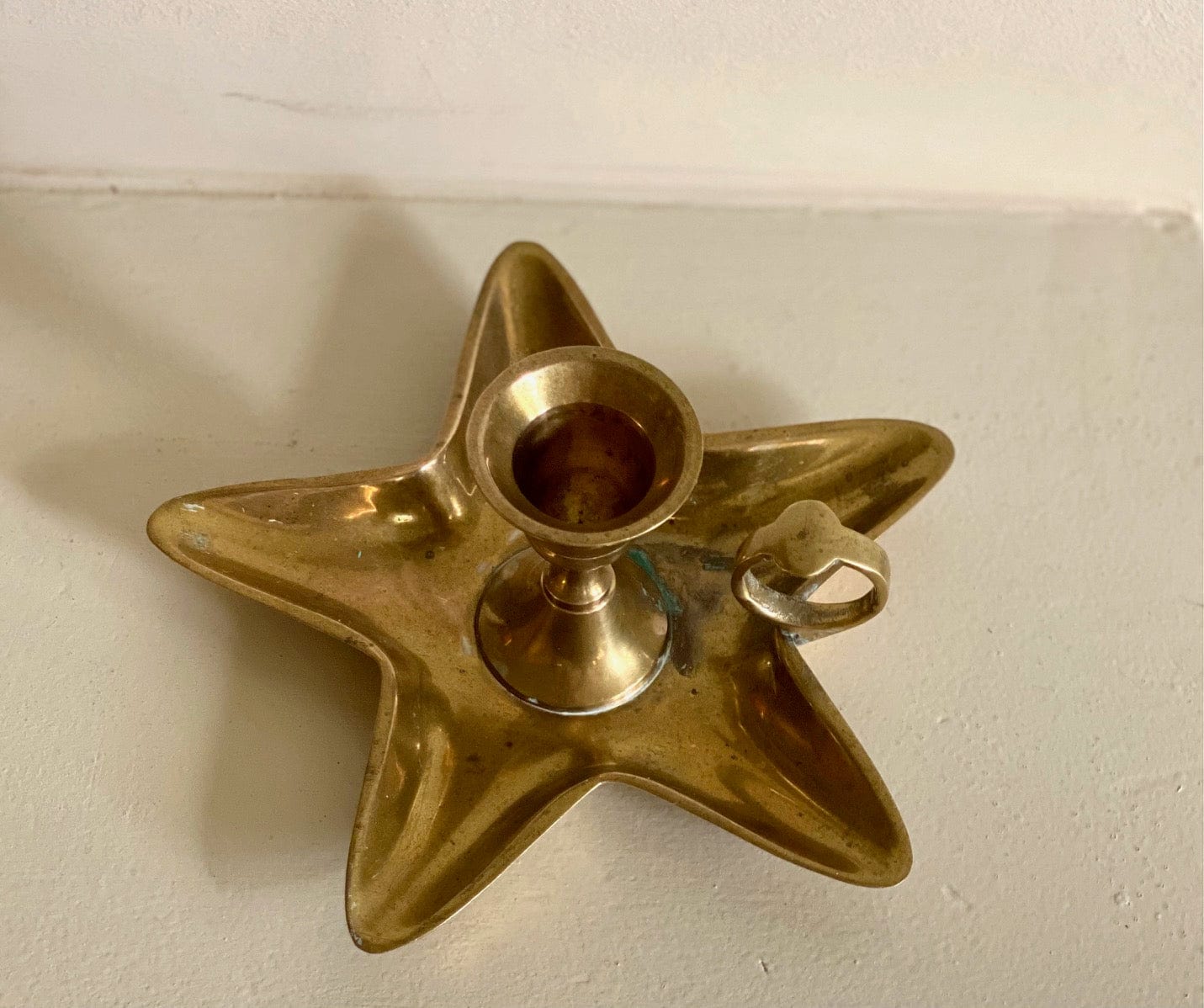 KEPT London Stock Brass star shaped chamberstick
