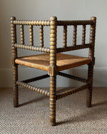 Load image into Gallery viewer, KEPT London Stock Corner bobbin turned chair with rush seat
