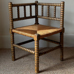 Load image into Gallery viewer, KEPT London Stock Corner bobbin turned chair with rush seat
