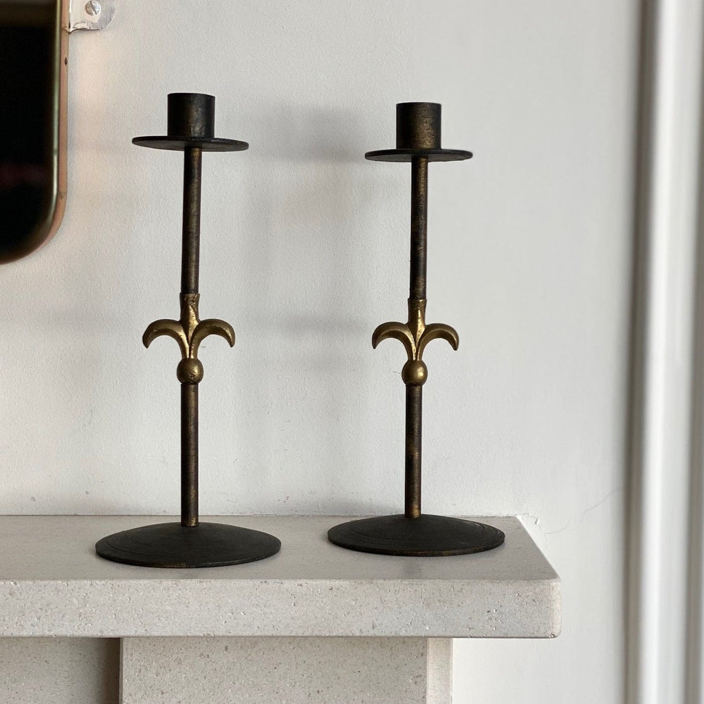 KEPT London Iron and brass candlesticks