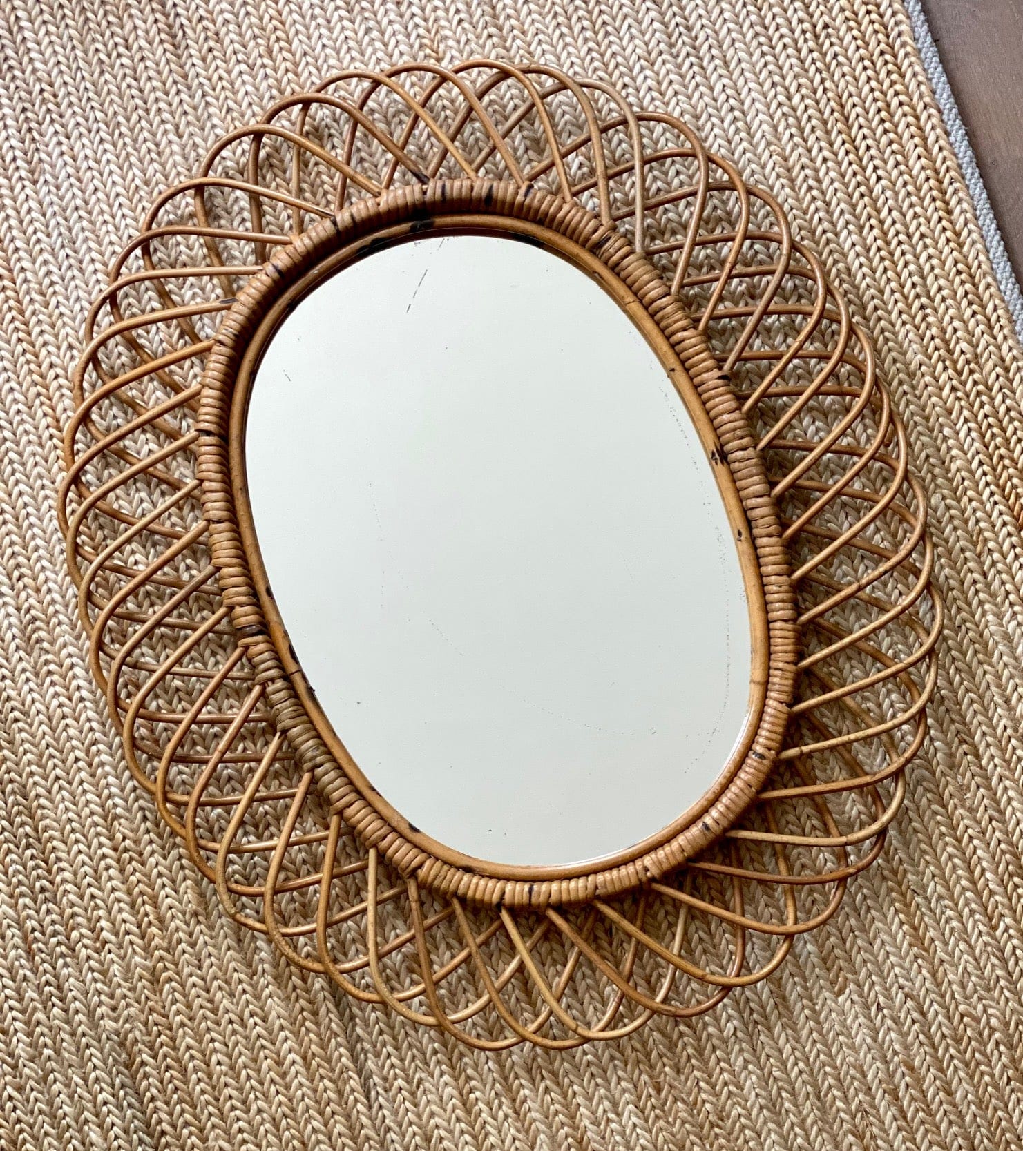 KEPT London Stock Oval cane mirror, attributed to Franco Albini