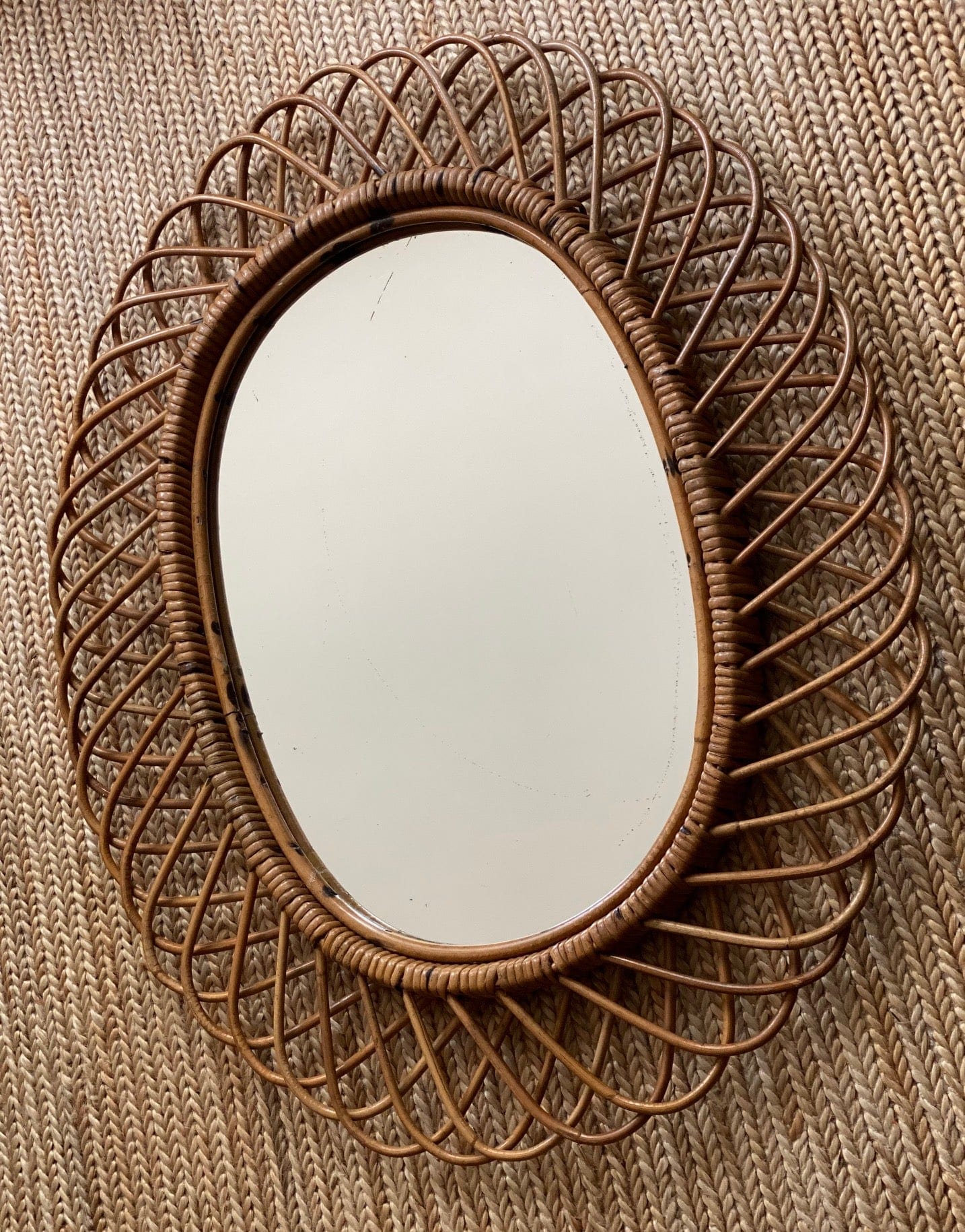 KEPT London Stock Oval cane mirror, attributed to Franco Albini
