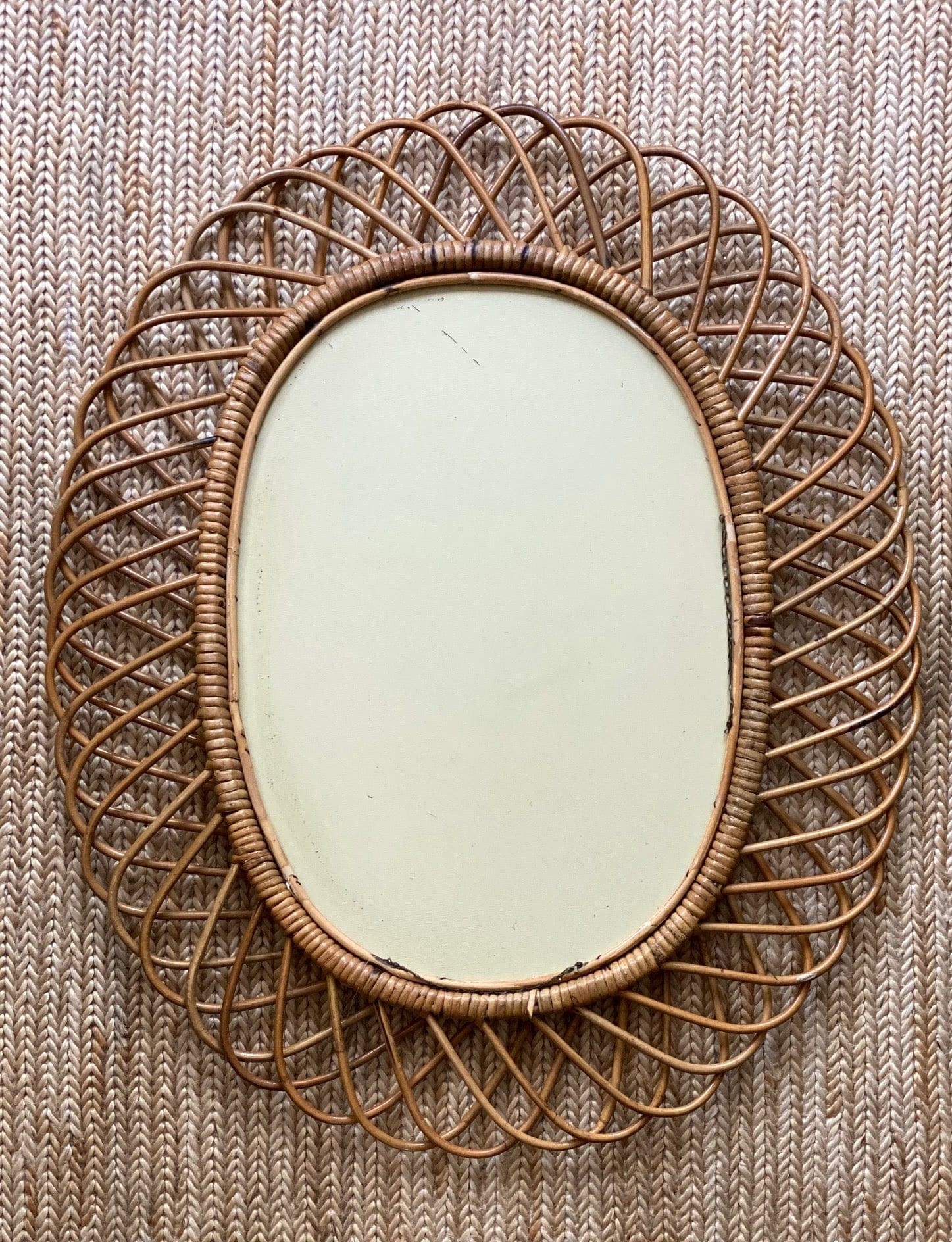 KEPT London Stock Oval cane mirror, attributed to Franco Albini