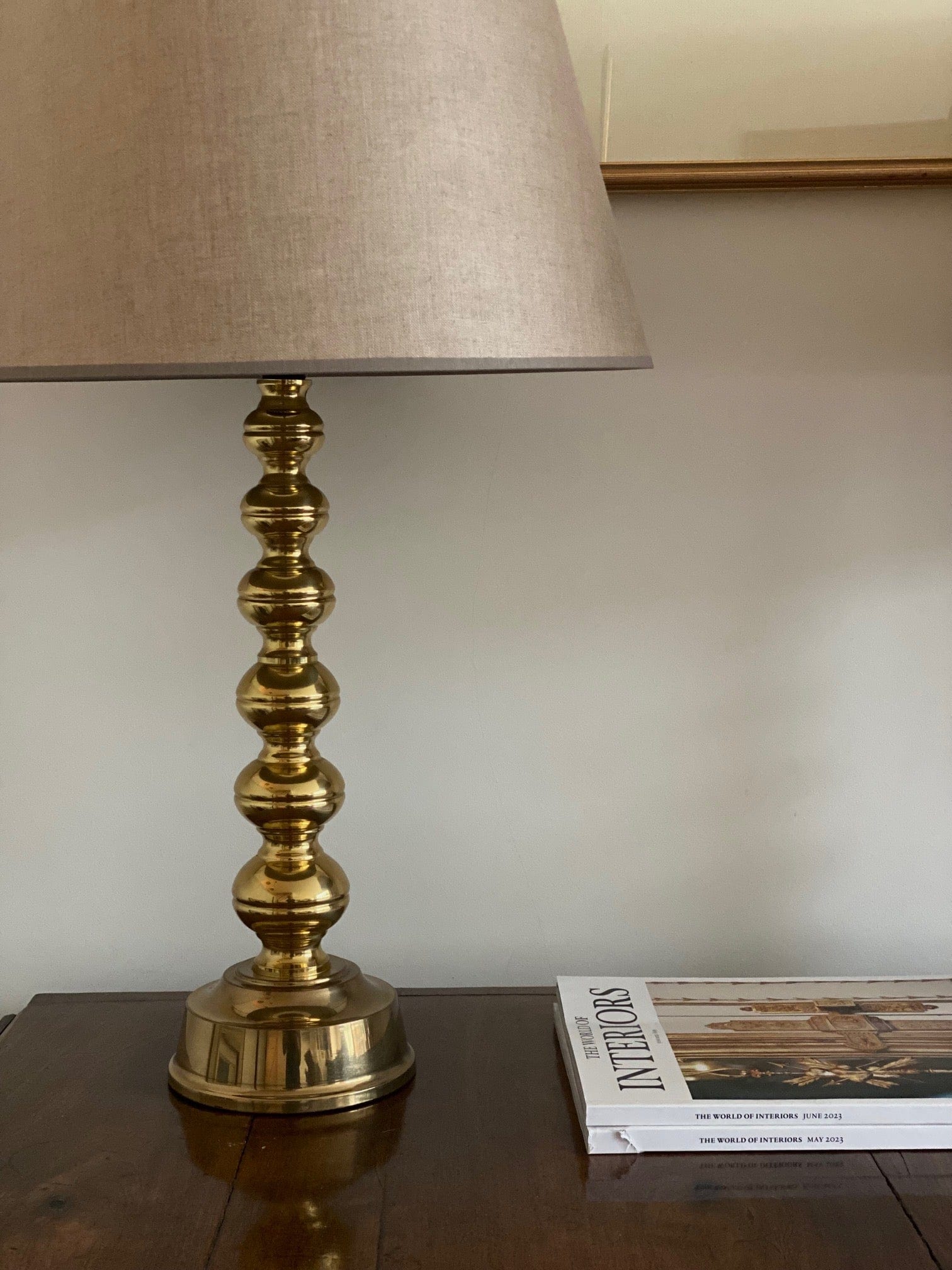 KEPT London Pair of brass bobbin table lamps