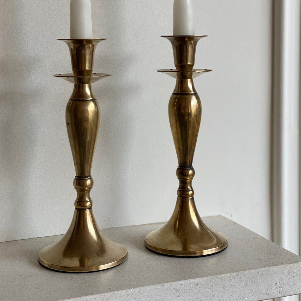KEPT London Stock Pair of brass curvy candlesticks