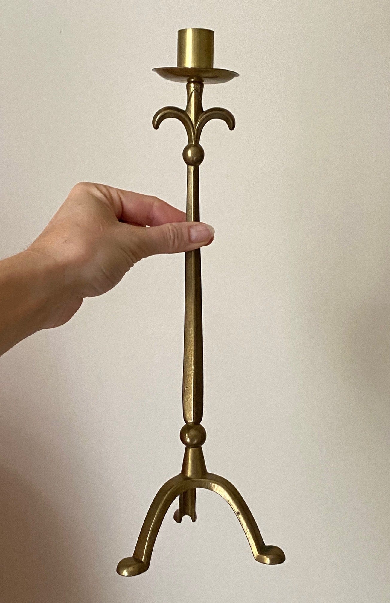 KEPT London Stock Pair of brass stalk candlesticks