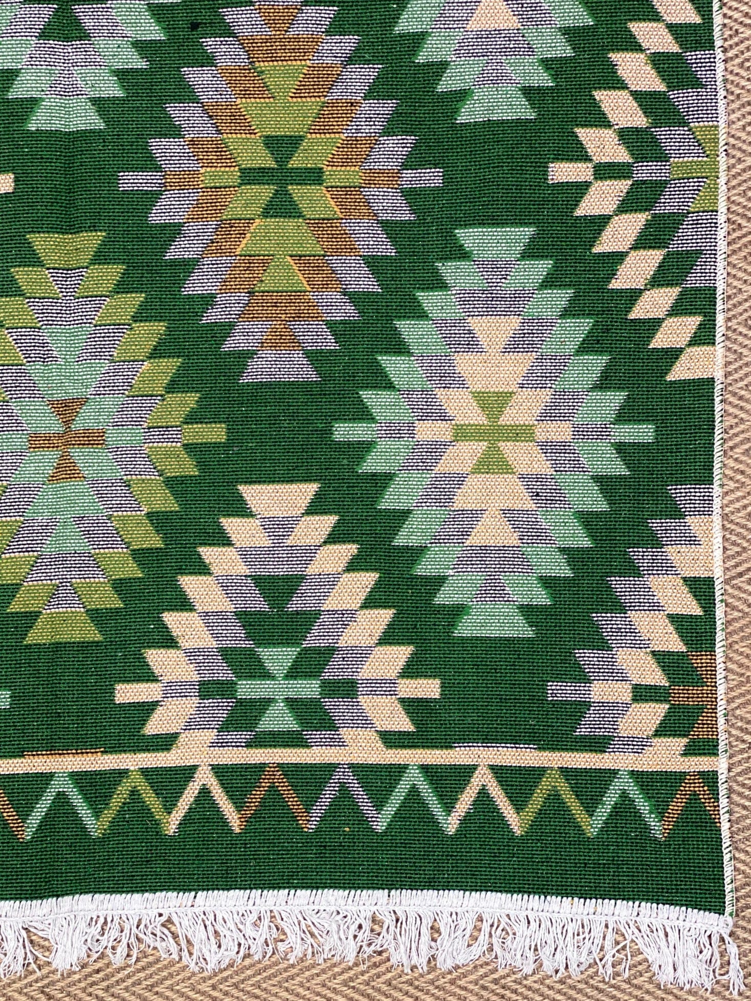 KEPT London Stock Pair of green and peach kilim style rugs
