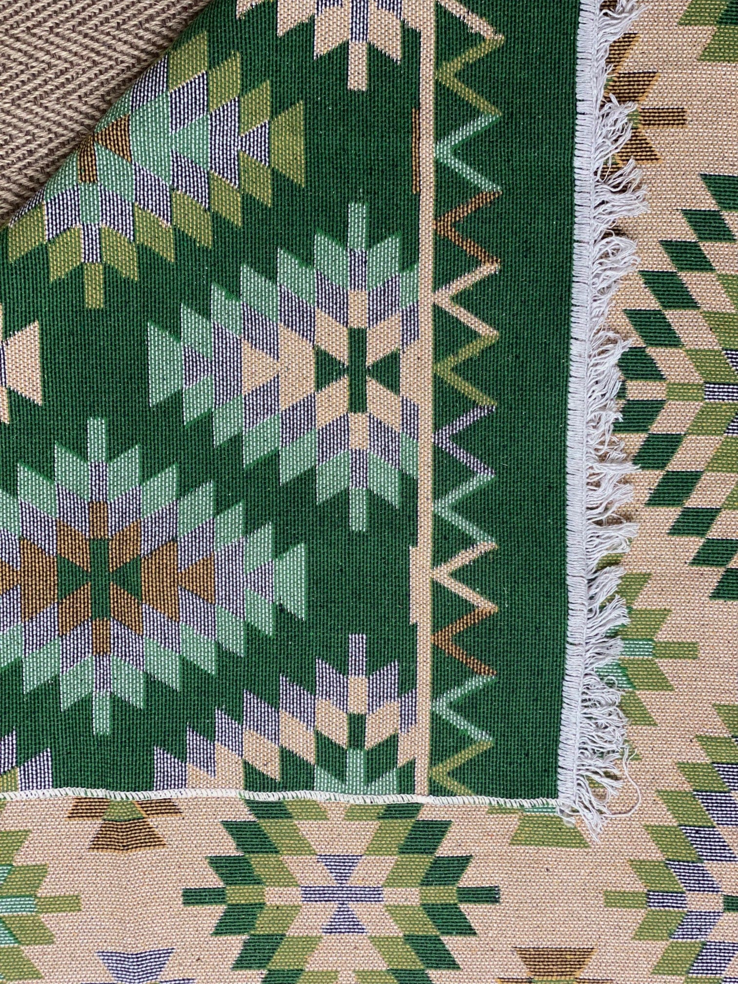 KEPT London Stock Pair of green and peach kilim style rugs