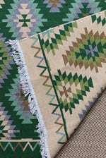 Load image into Gallery viewer, KEPT London Stock Pair of green and peach kilim style rugs
