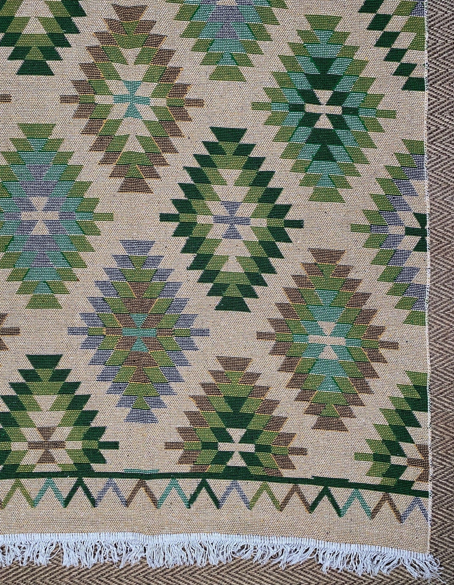 KEPT London Stock Pair of green and peach kilim style rugs
