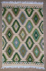 Load image into Gallery viewer, KEPT London Stock Pair of green and peach kilim style rugs

