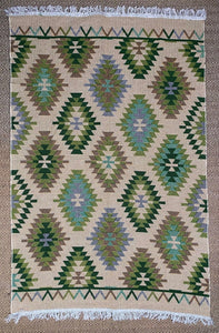 KEPT London Stock Pair of green and peach kilim style rugs