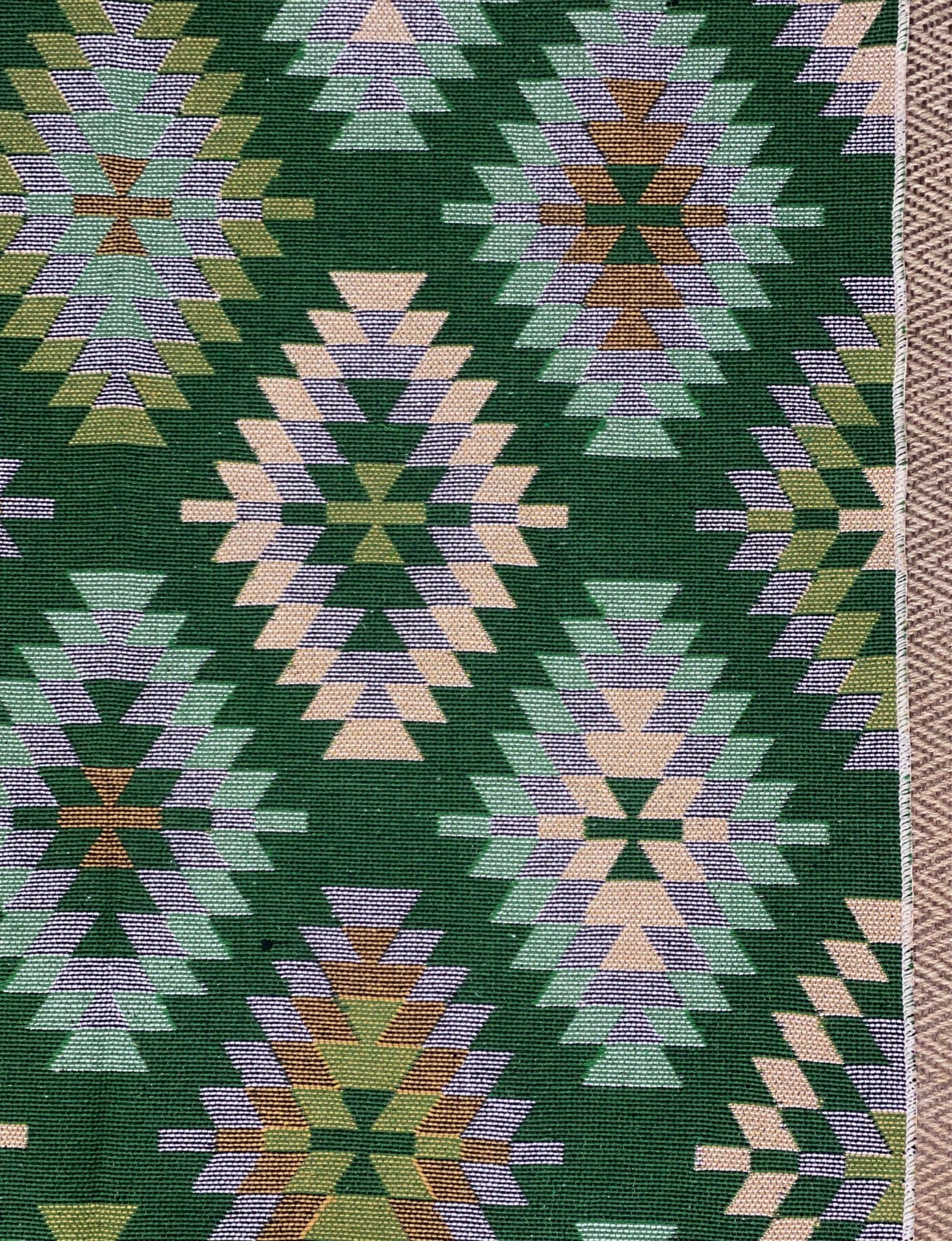 KEPT London Stock Pair of green and peach kilim style rugs