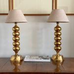 Load image into Gallery viewer, KEPT London Stock Pair of large brass bobbin table lamps
