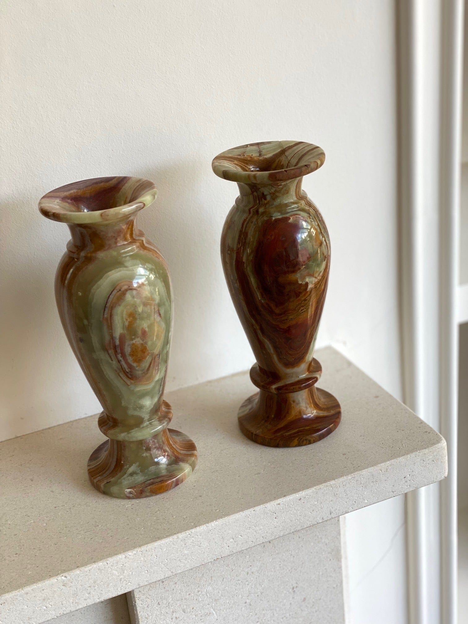 KEPT London Stock Pair of onyx marbled vases