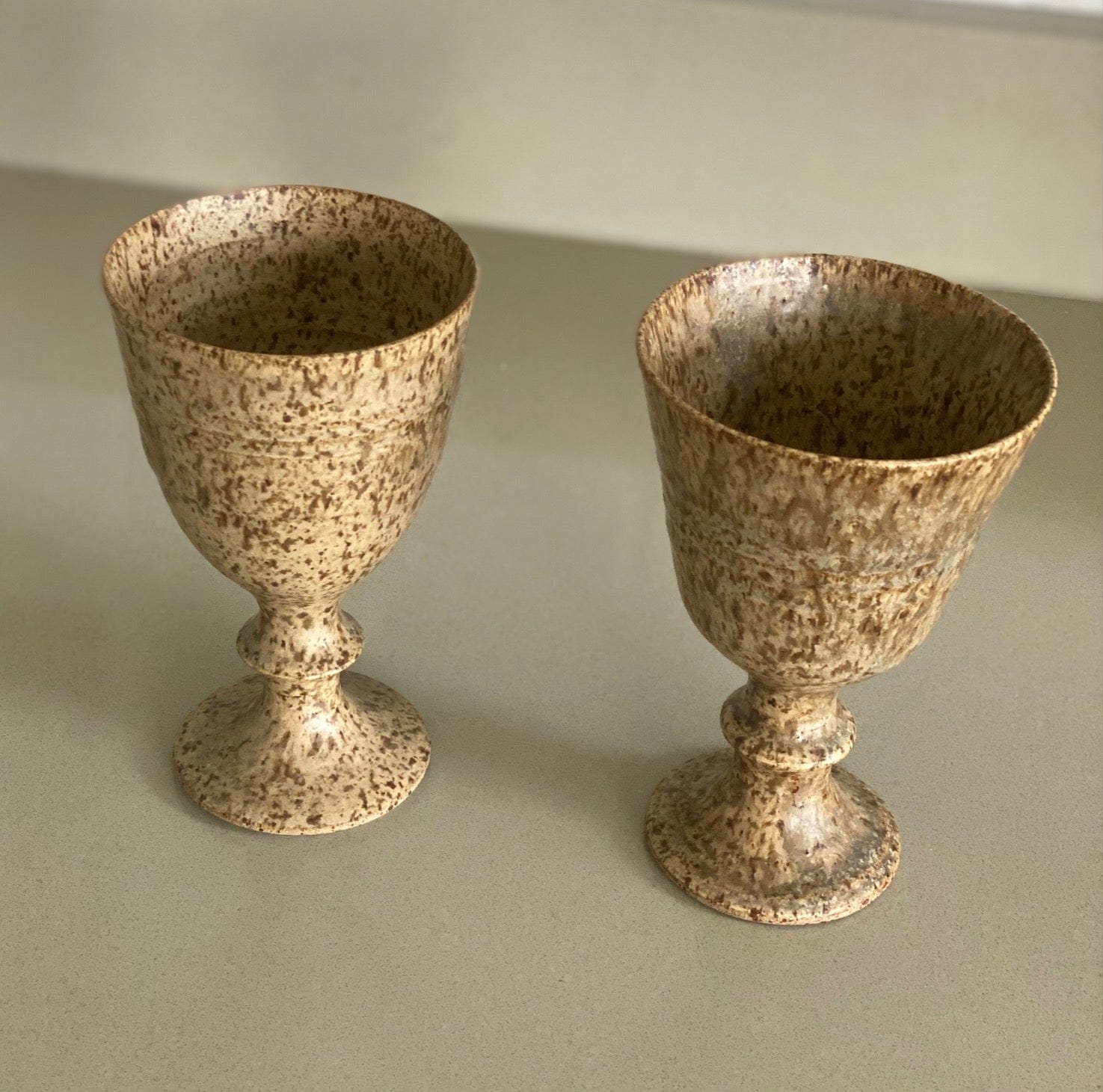 KEPT London Stock Pair of pottery goblets