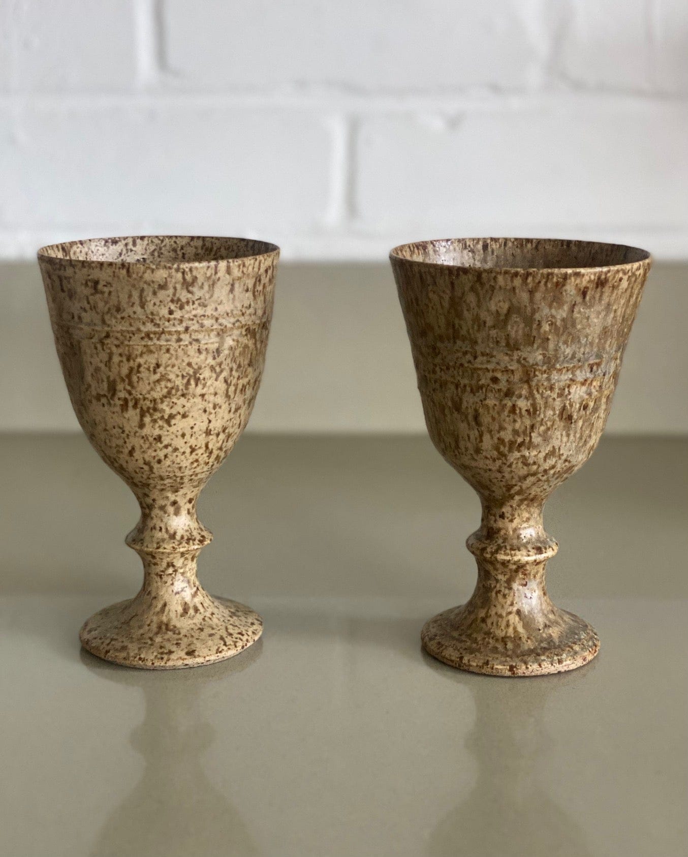 KEPT London Stock Pair of pottery goblets
