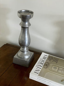 KEPT London Pair of silver metal candlesticks