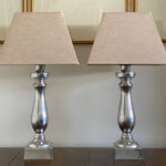 Load image into Gallery viewer, KEPT London Pair of silver metal lamps
