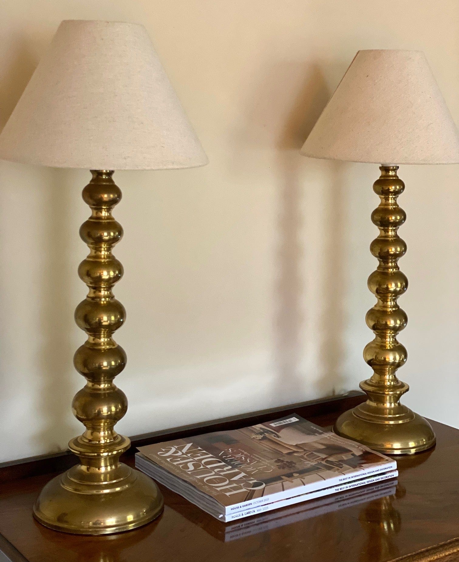 KEPT London Stock Pair of tall brass bobbin table lamps