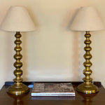 Load image into Gallery viewer, KEPT London Stock Pair of tall brass bobbin table lamps
