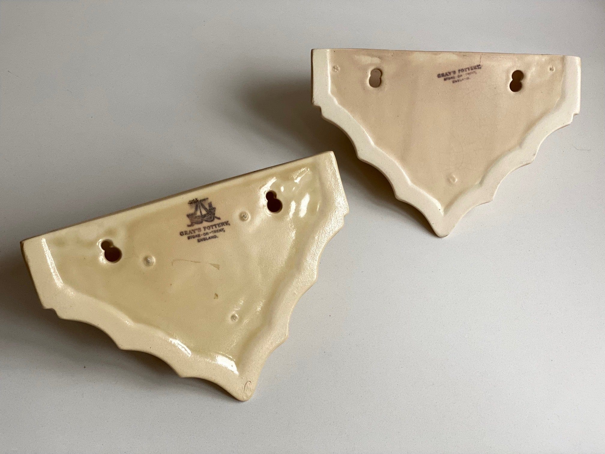KEPT London Stock Pair of wall vases, Gray's pottery