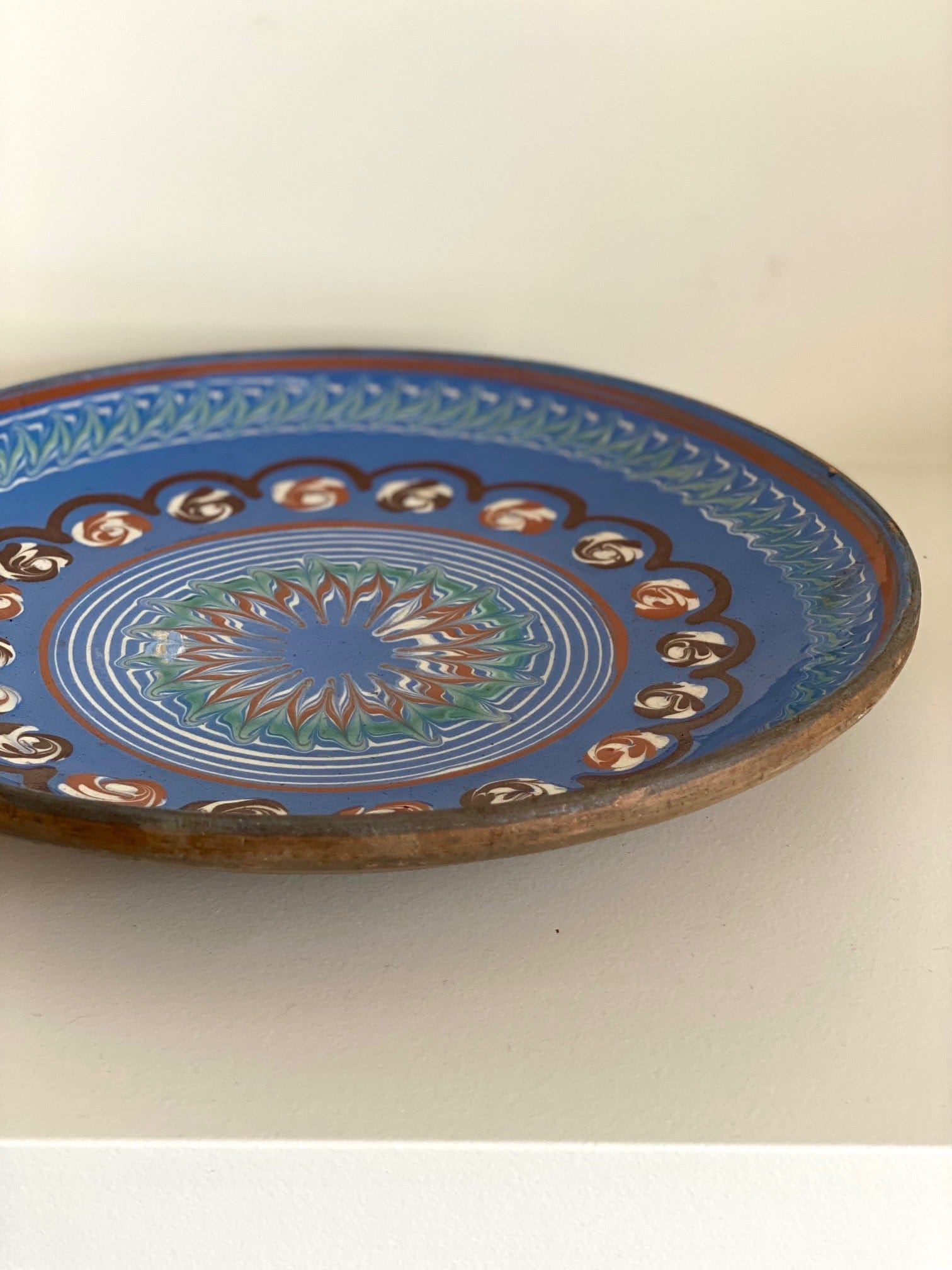 KEPT London Romanian slipware plate, blue and terracotta