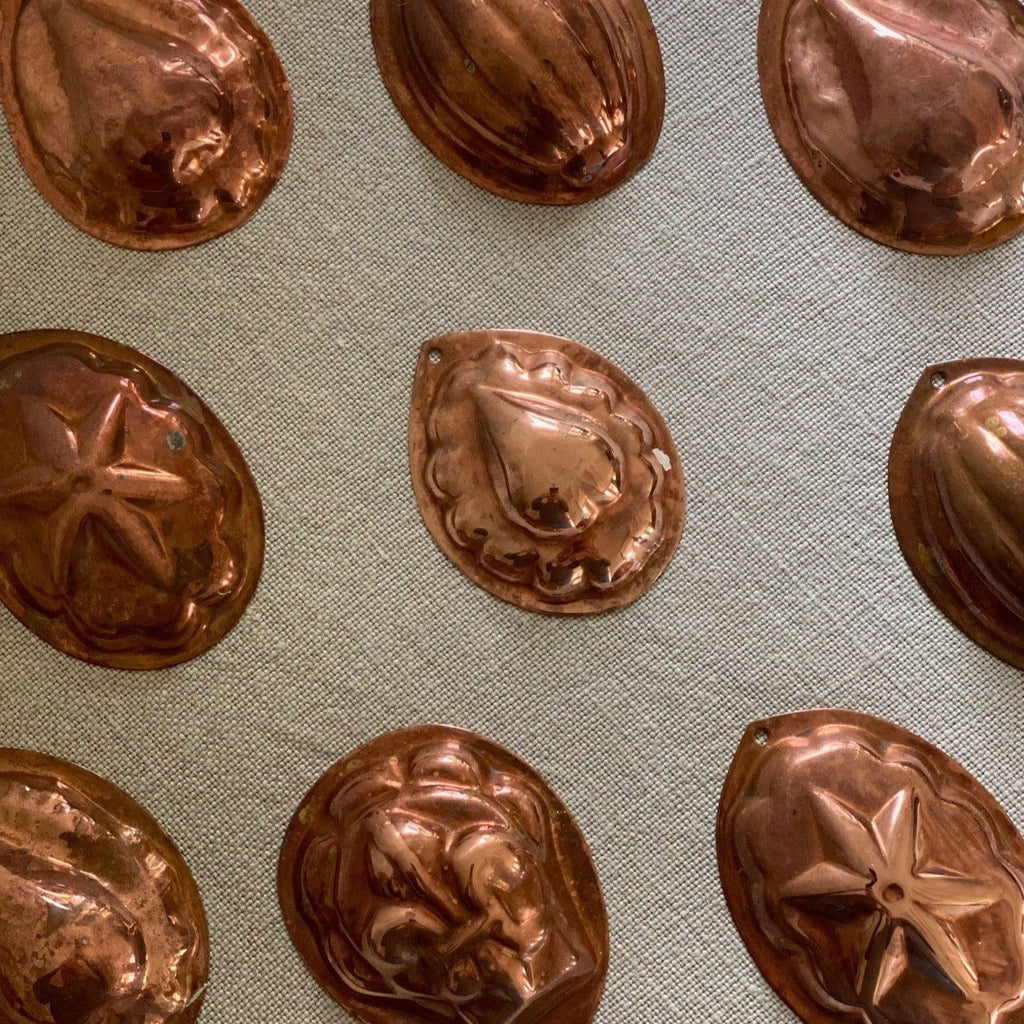 KEPT London Set of nine copper madeleine moulds