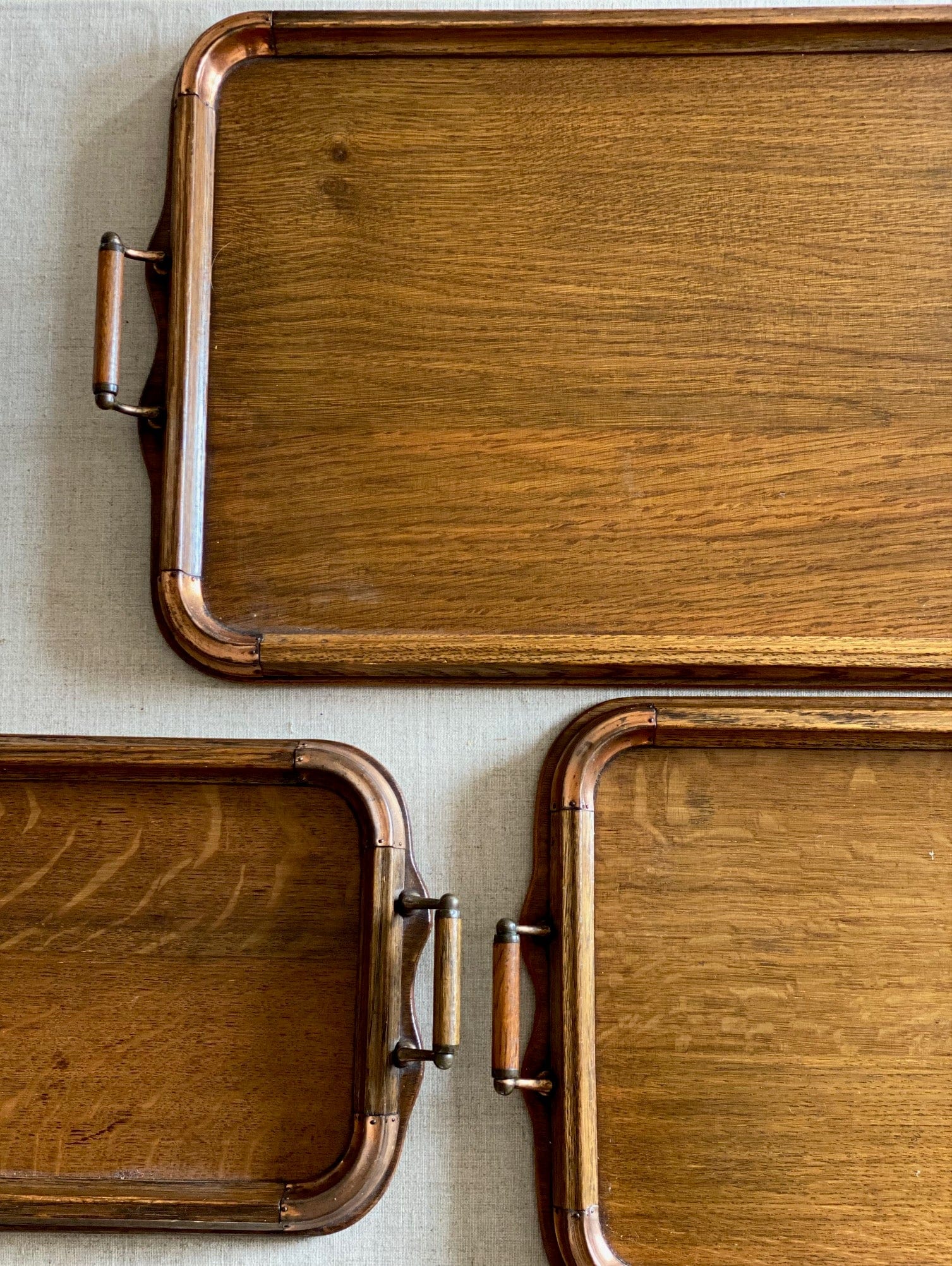 KEPT London Stock Set of three oak trays with copper detail