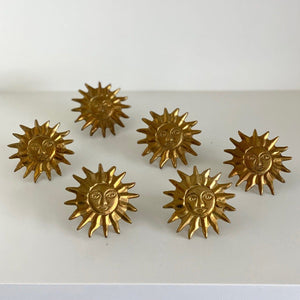 KEPT London Six sunburst brass napkin rings
