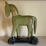 Load image into Gallery viewer, KEPT London Stock Vintage carved wooden horse, with wheels
