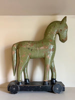Load image into Gallery viewer, KEPT London Stock Vintage carved wooden horse, with wheels
