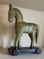 Load image into Gallery viewer, KEPT London Stock Vintage carved wooden horse, with wheels
