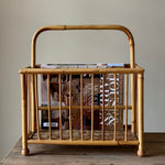 Load image into Gallery viewer, KEPT London Stock Wicker magazine rack with ball feet

