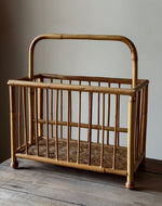 Load image into Gallery viewer, KEPT London Stock Wicker magazine rack with ball feet
